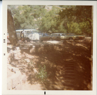Cars parked in the lot at the Weeping Rock trailhead.