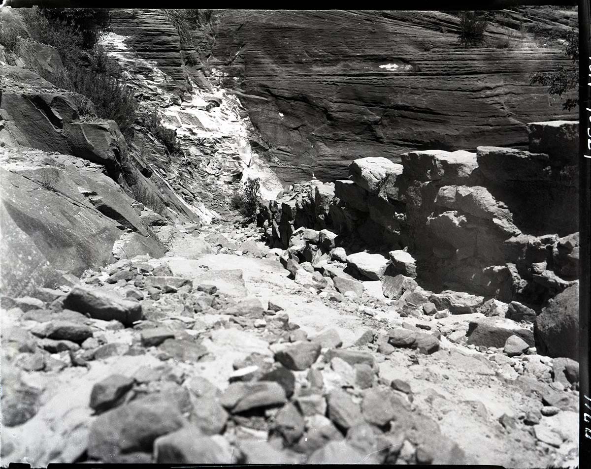 Damage done by storm of July 25, 1954 to West Rim Trail.
