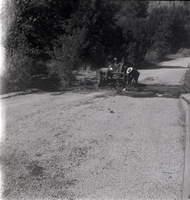 Men repairing a section of road along the scenic canyon drive near the Grotto.