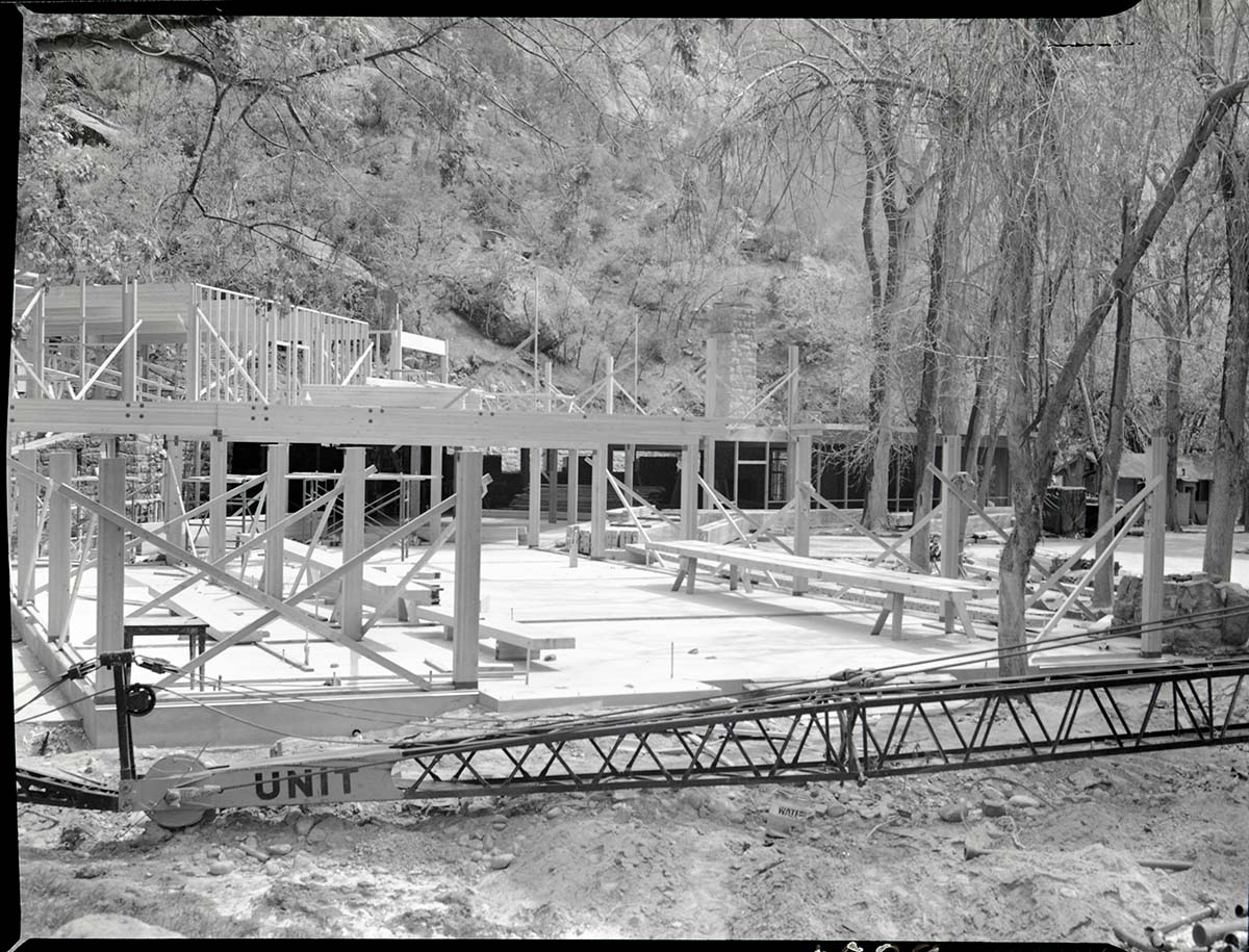 Rebuilding Zion Lodge after fire of January 28, 1966 - walls and ceilings of much of lodge in place.