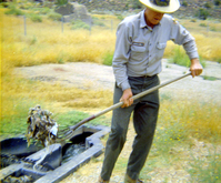 Man working on the treatment plant equipment.