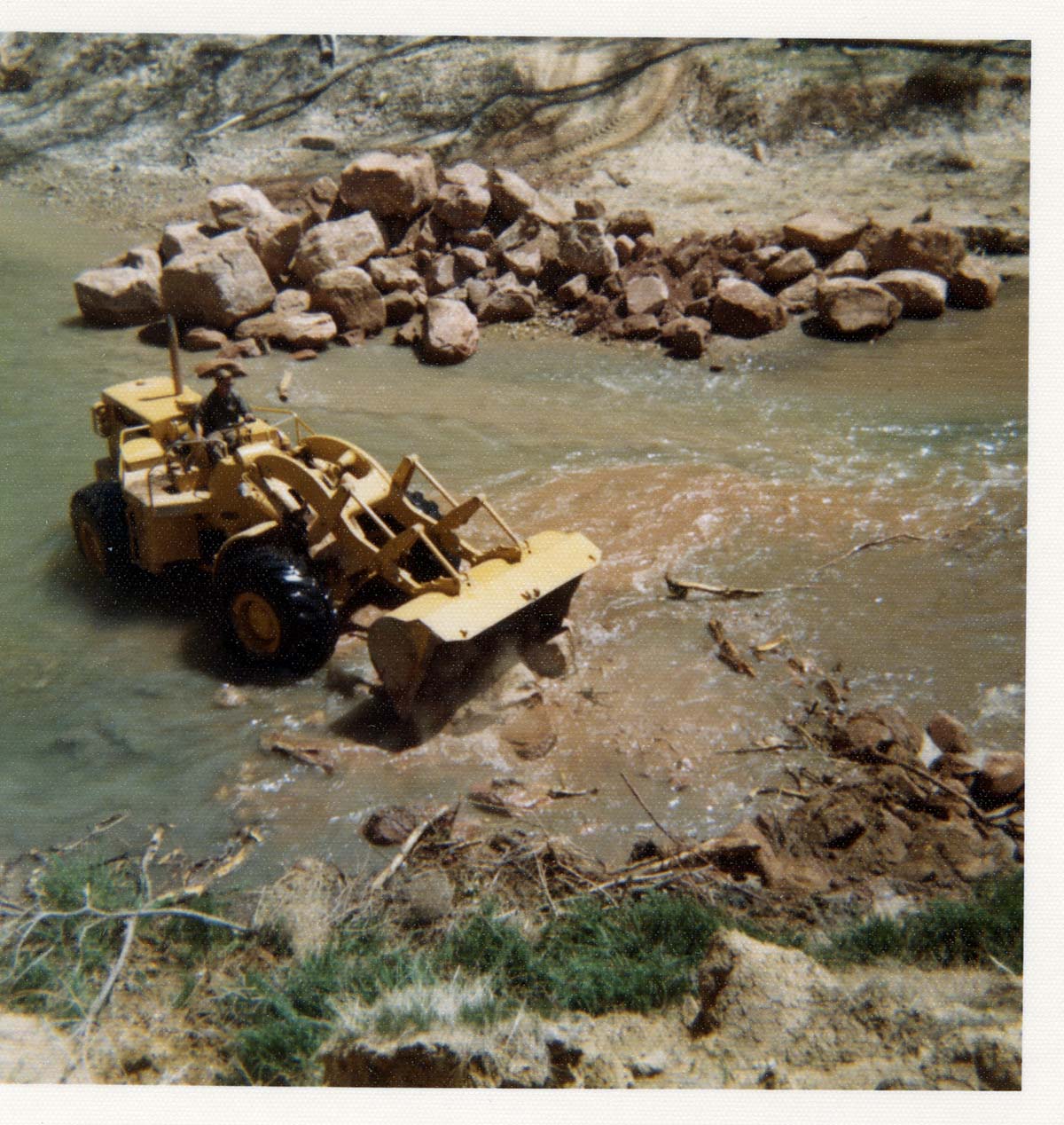 Color photos of channel clearing and bank stabilization along the Virgin River near Birch Creek.