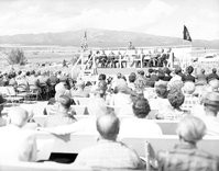 Warren F. Hamilton, Superintendent of Zion National Park, addressing visitors from podium at dedication of Taylor Creek road (Kolob Canyons).