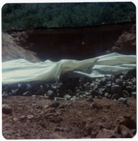 Rock pile covered with tarp during road work/repair in Kolob Canyon.