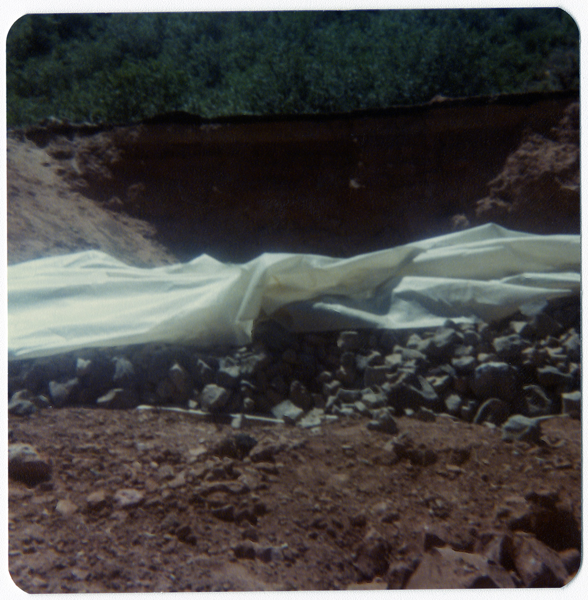 Rock pile covered with tarp during road work/repair in Kolob Canyon.
