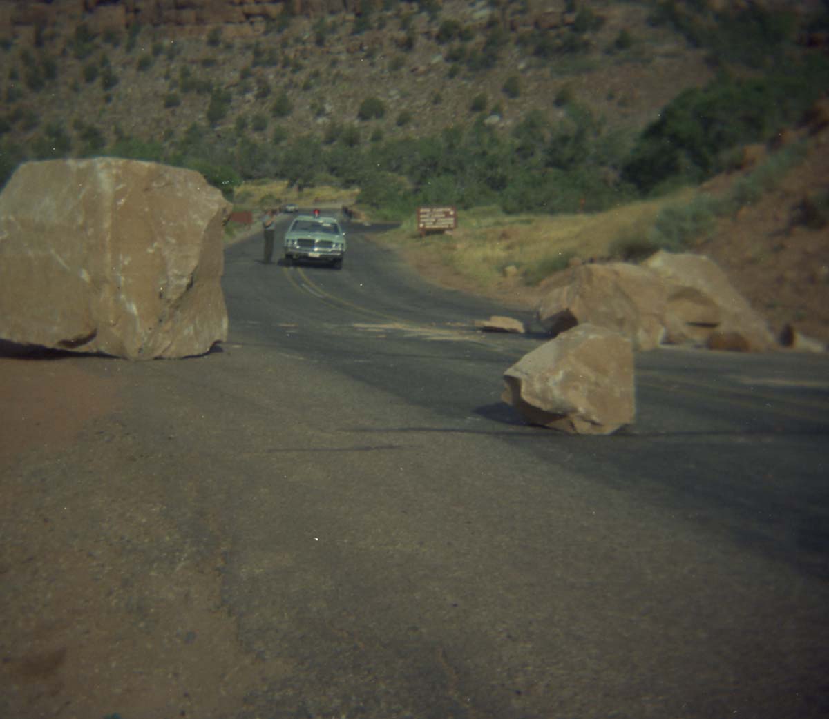 Color Photo of a rock slide near the junction of routes 1 and 2.