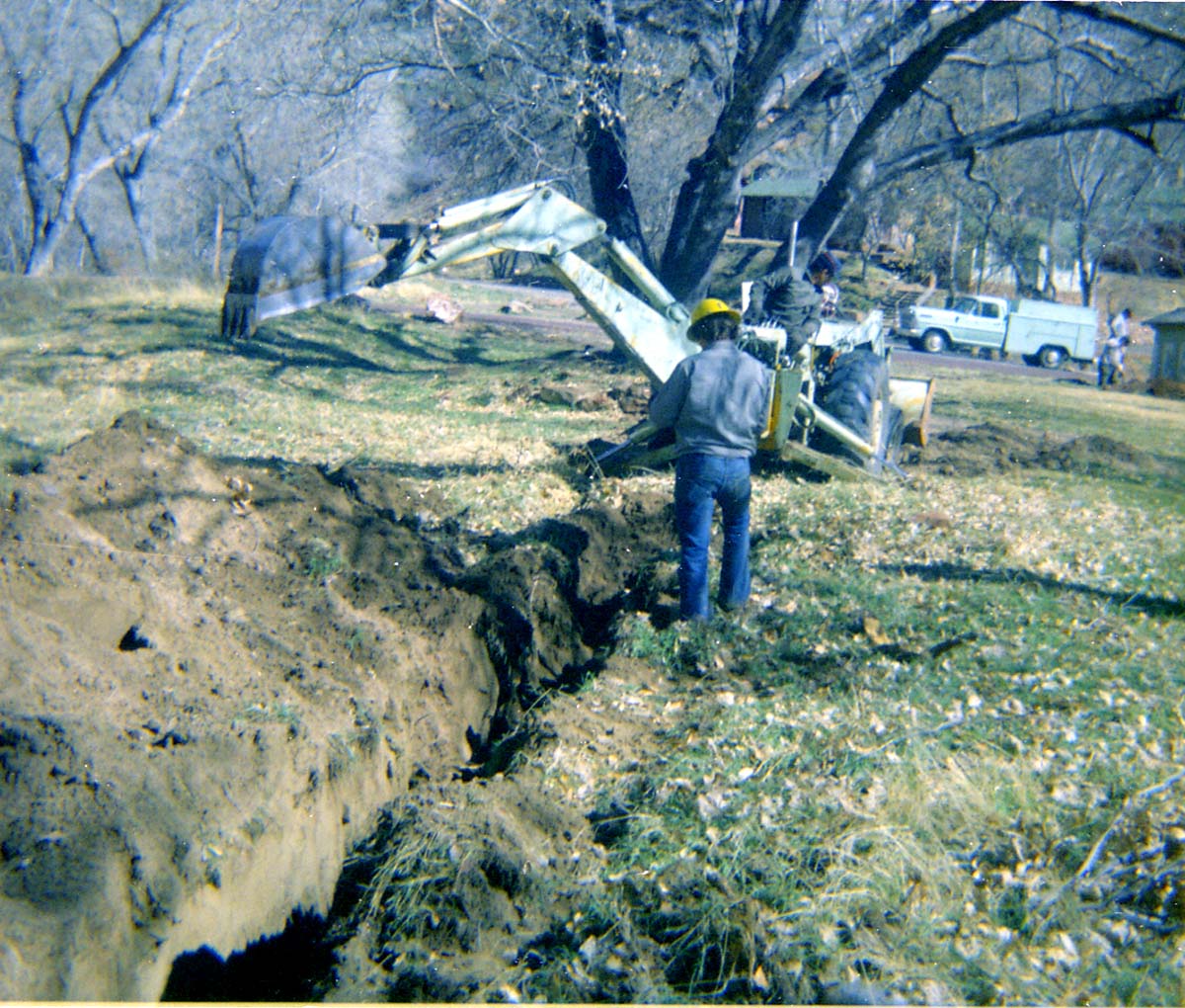 Construction vehicles and workers during the Zion Lodge utilities project.