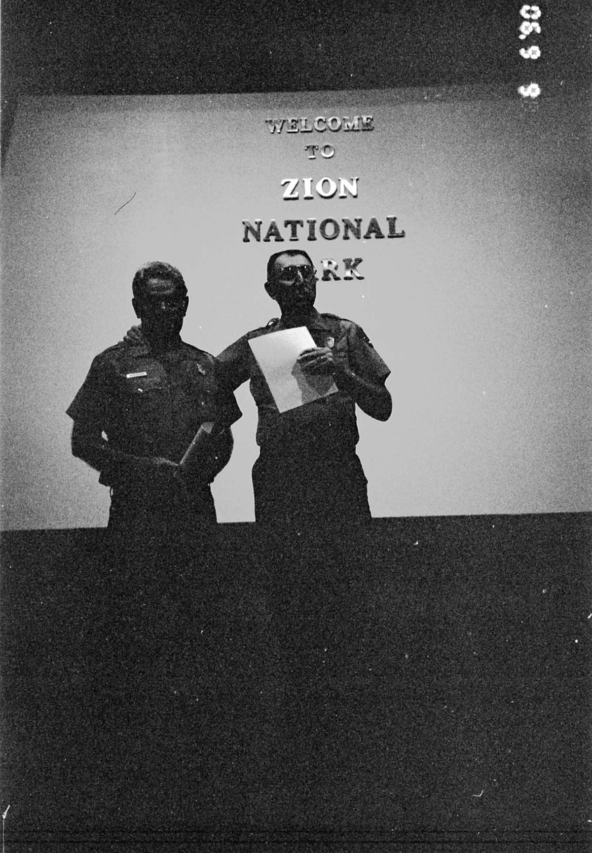 BW Photos of Superintendent Harold Grafe giving out awards to park personnel.