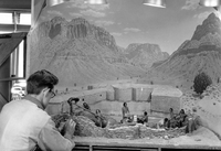 Western Museum Laboratory (WML) worker assembling the Zion Museum's Indian Pueblo diorama exhibit.