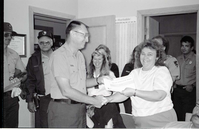BW Photos of Superintendent Harold Grafe giving out awards to park personnel.