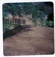 Dirt road leading up to the Zion Lodge footbridge during emplacement.