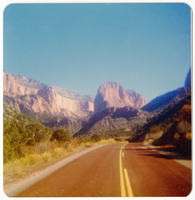 Paved road and landscape while driving along the Kolob Terrace Road - North Unit.