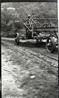 Worker driving a road grader in Zion Canyon.