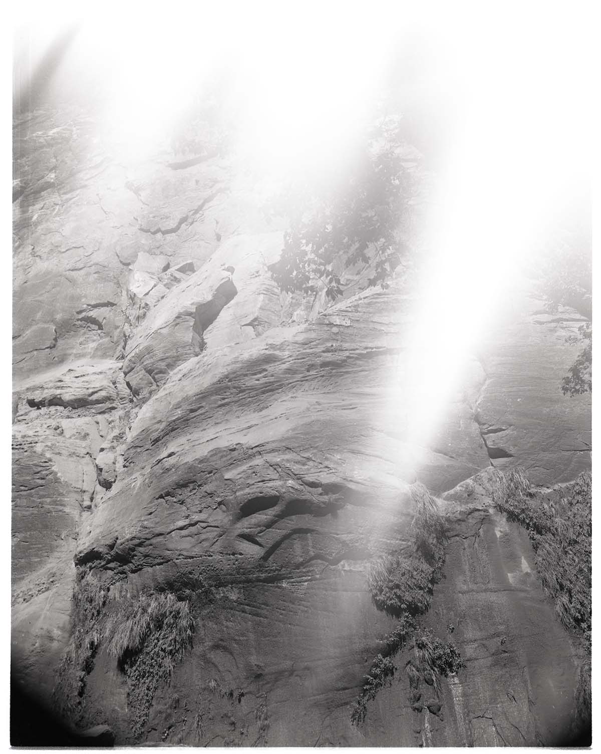BW photo of a rock slide along the Narrows Trail.