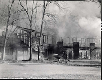 Destructive fire in the Zion Lodge, fire fighters and burning building.