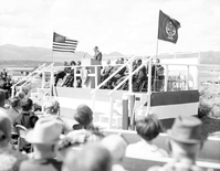 Gerreld L. Pulsipher, Director of Utah Travel Council, addressing visitors from podium at dedication of Taylor Creek road (Kolob Canyons).