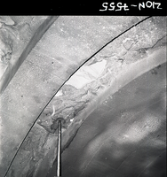 Drilling equipment and operator obtaining test cores in Zion-Mt. Carmel tunnel.