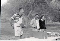 BW Photos of the Crocker/ Nicholson retirement barbeque. Superintendent Harold Grafe in apron speaking.