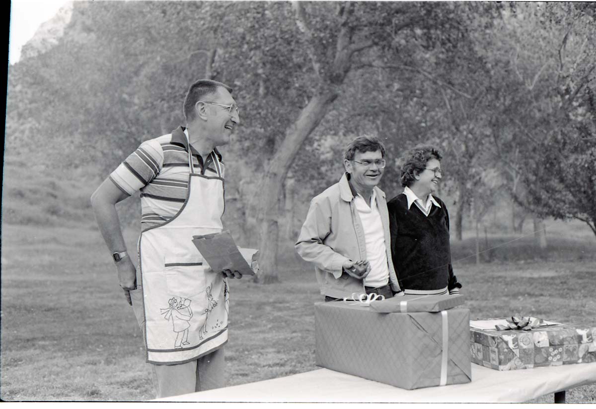 BW Photos of the Crocker/ Nicholson retirement barbeque. Superintendent Harold Grafe in apron speaking.