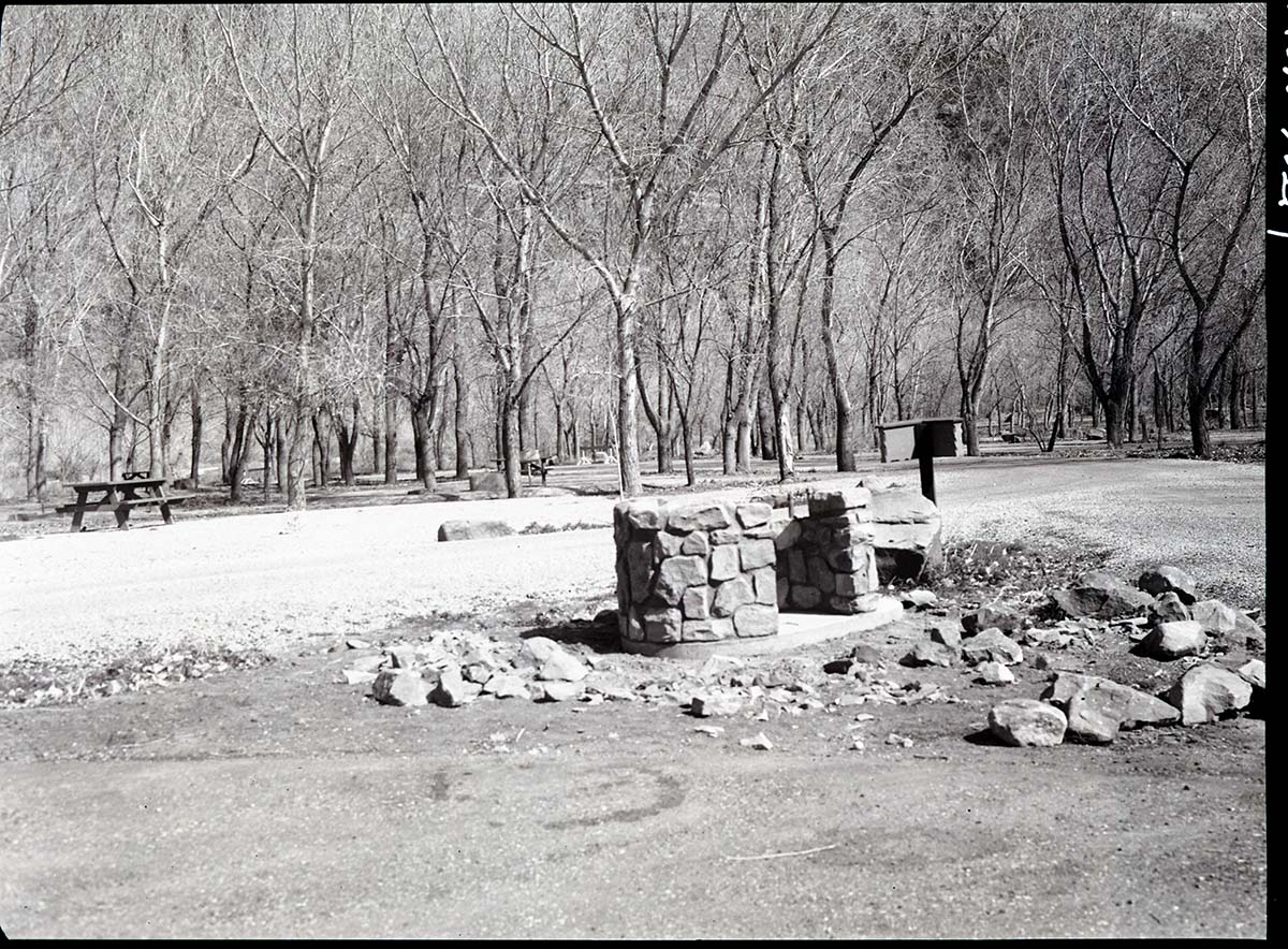 Container for garbage cans in South Campground.
