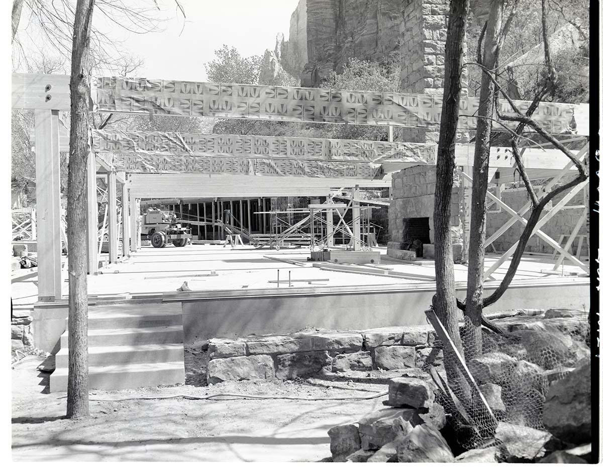 Rebuilding Zion Lodge after fire of January 28, 1966 - beginning of walls and beams of recreation hall.