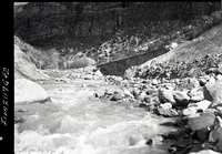Virgin River and the rock retaining wall alongside the road at the slide area in Zion Canyon.