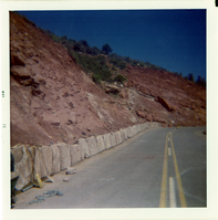 Road and slide control wall during construction along Kolob Canyon Road.