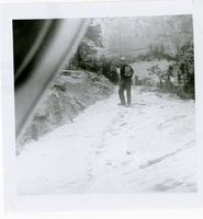 Man walking along the East Rim trail.