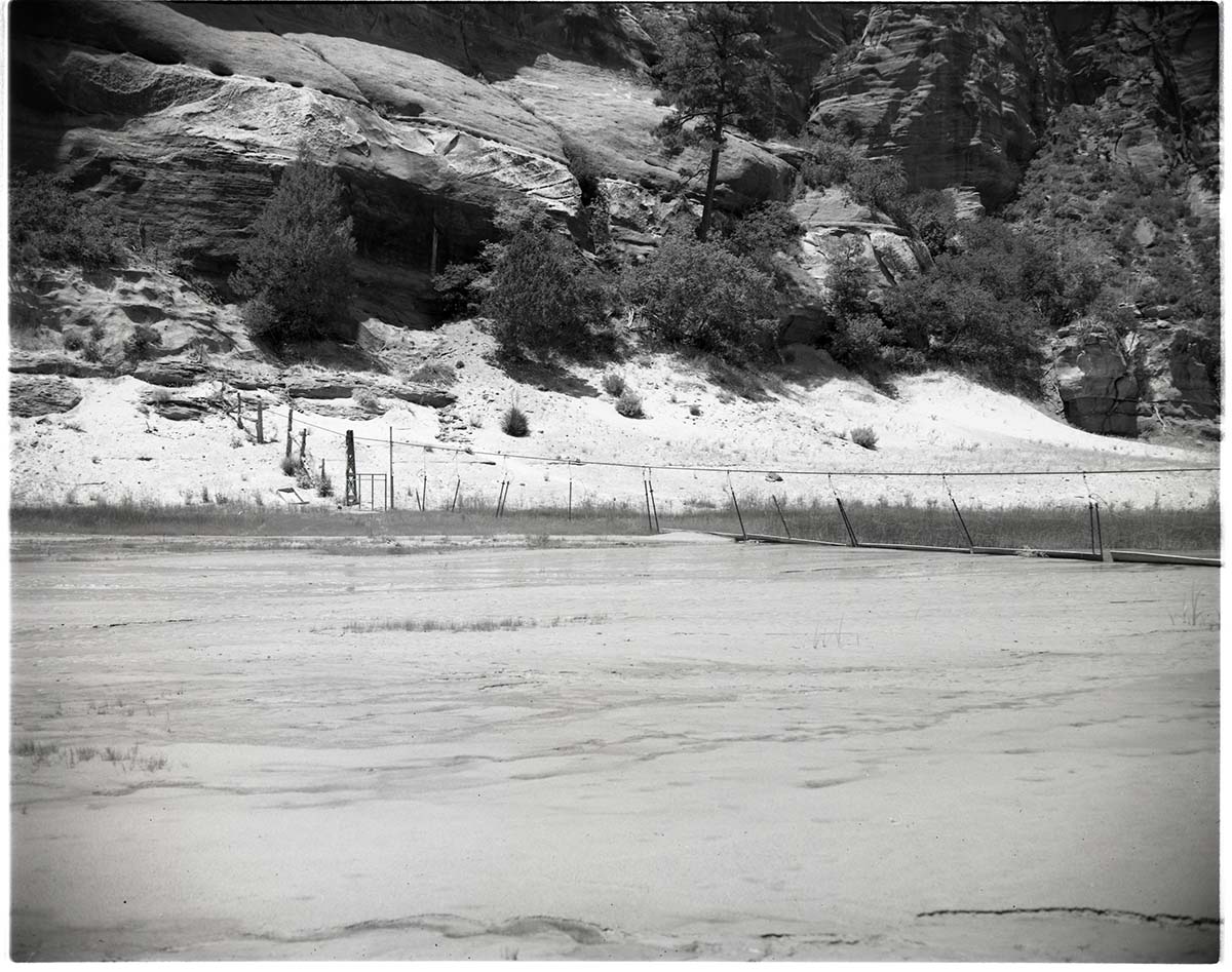 BW photo of the 1937 grazing study - 4x5. Fence line across canyon in Hop Valley.