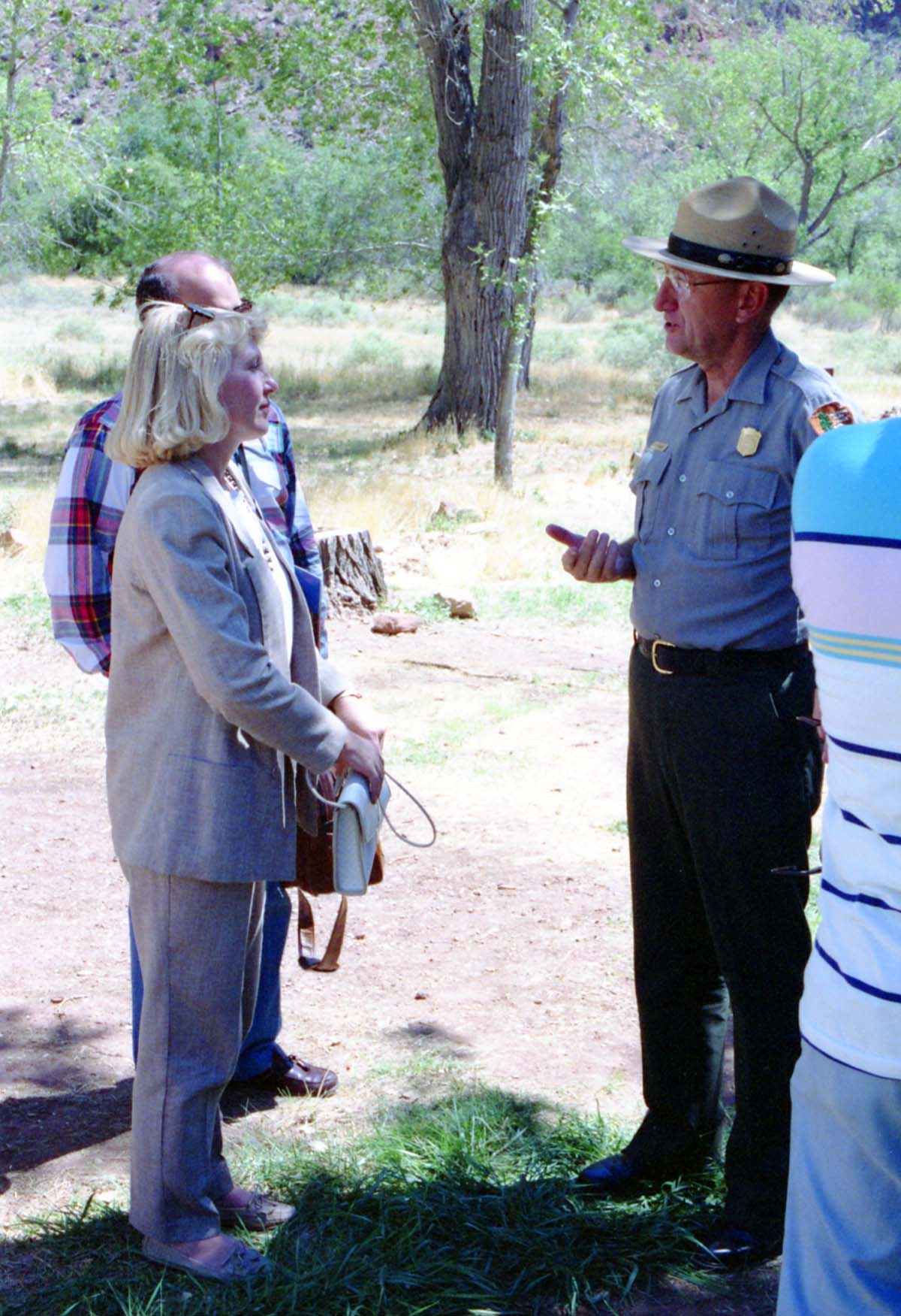 Color Photos of the parks 72nd anniversary celebrations- cake cutting, barbecue, speakers.