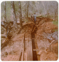 Workers uncovering the irrigation ditch in South Campground.