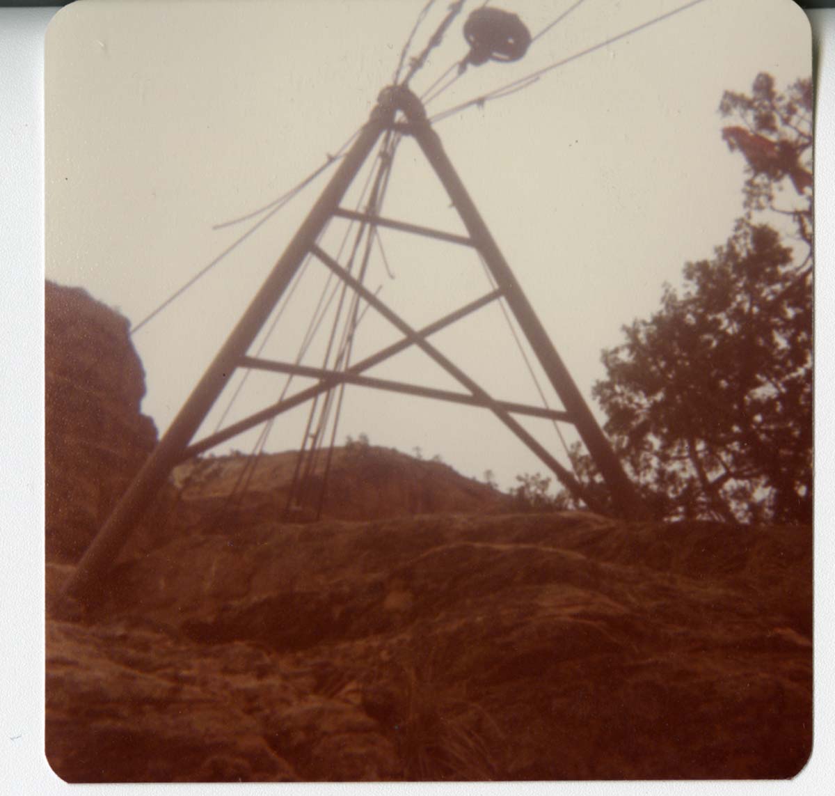Construction equipment for Wiley Tank being transported on tramline.