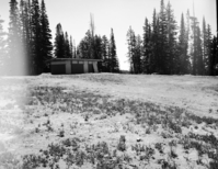 Newly constructed comfort station with winterizing panels on windows and doors.