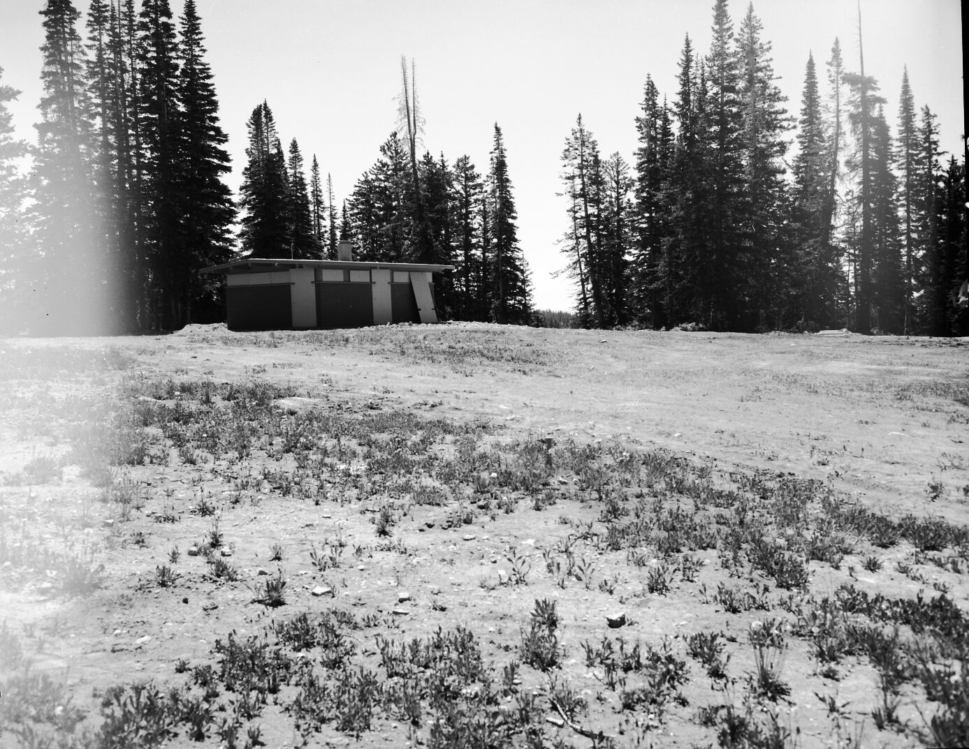 Newly constructed comfort station with winterizing panels on windows and doors.