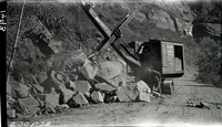 Zion Canyon road construction, large boulders taken from road. The cuts were used in the revetments on the Virgin River.