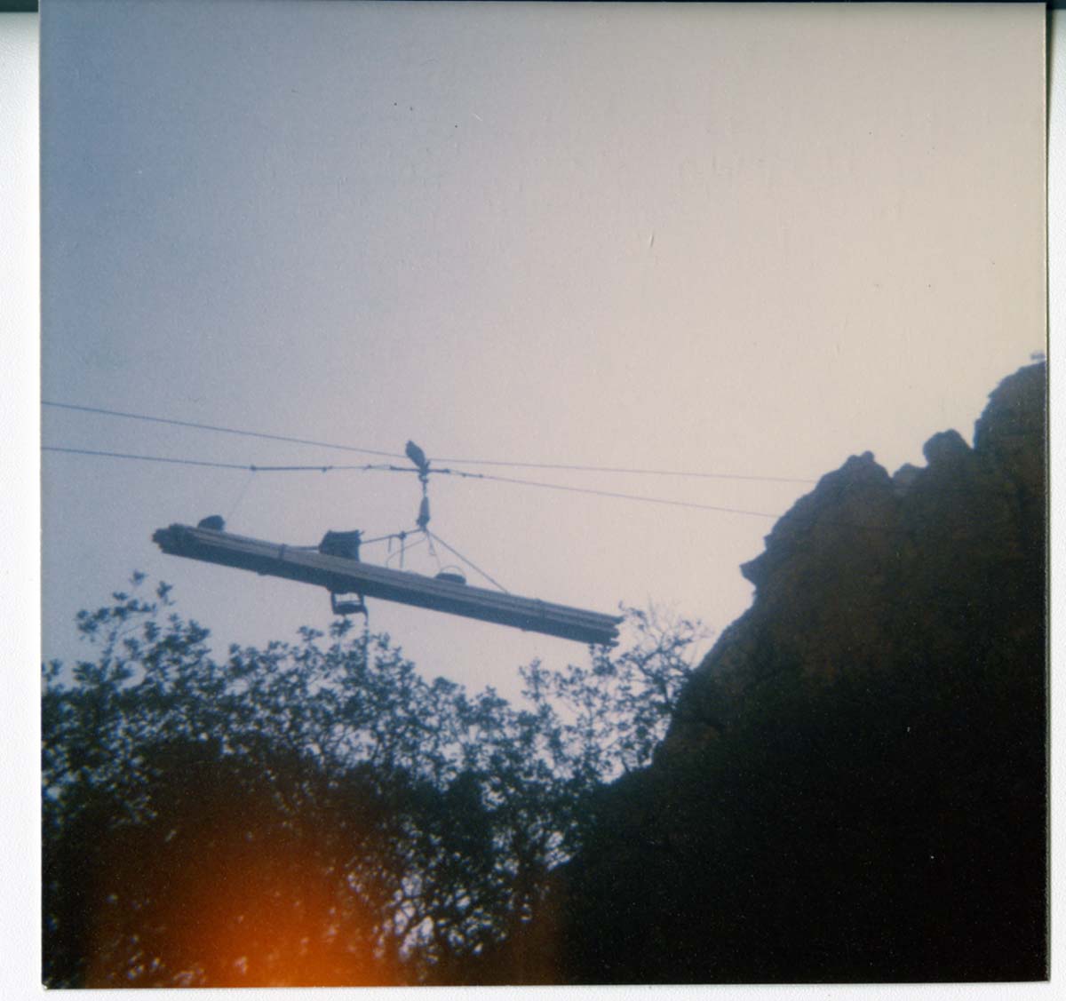 Equipment for the construction of Wiley Tank being transported by tramline.