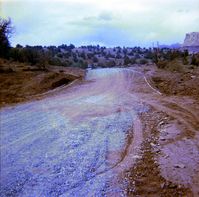 Dirt road and surrounding landscape.