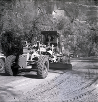 Excavator smoothing out road during construction near the Temple of Sinawava.