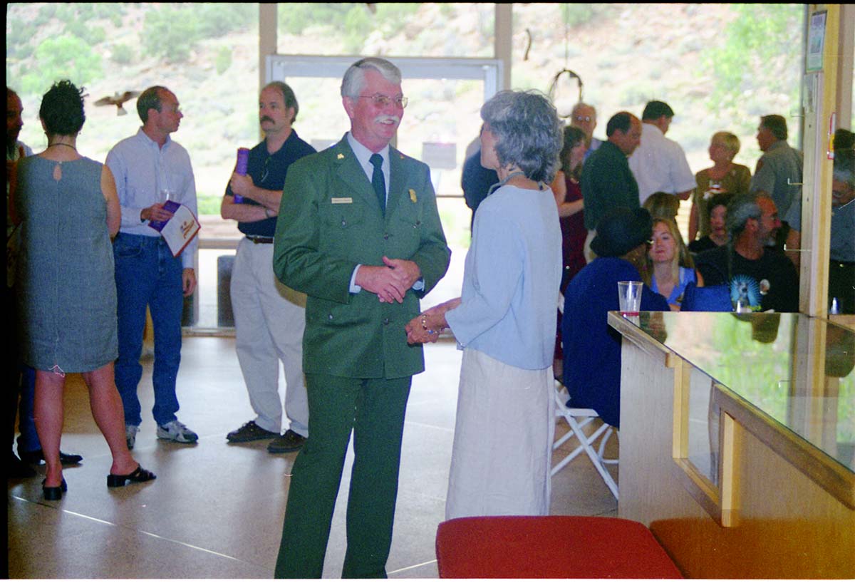 Color Photos of the opening celebration for the new visitor center - Same day as the official shuttle launch. Superintendent Donald A. Falvey speaking with visitor.