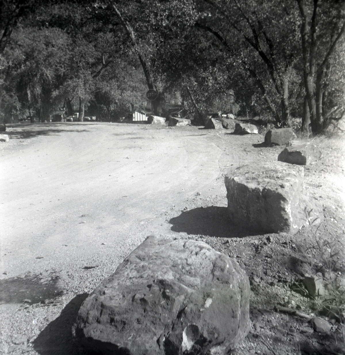 Large rocks lining the road along the scenic canyon drive near the Grotto.