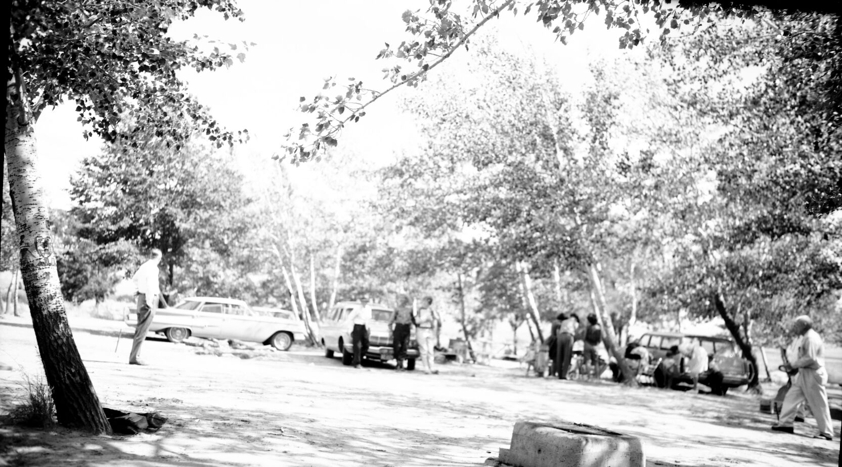 Alumni at Brown University reunion picnicking and horseshoe pitching at the Pipe Spring National Monument picnic area.