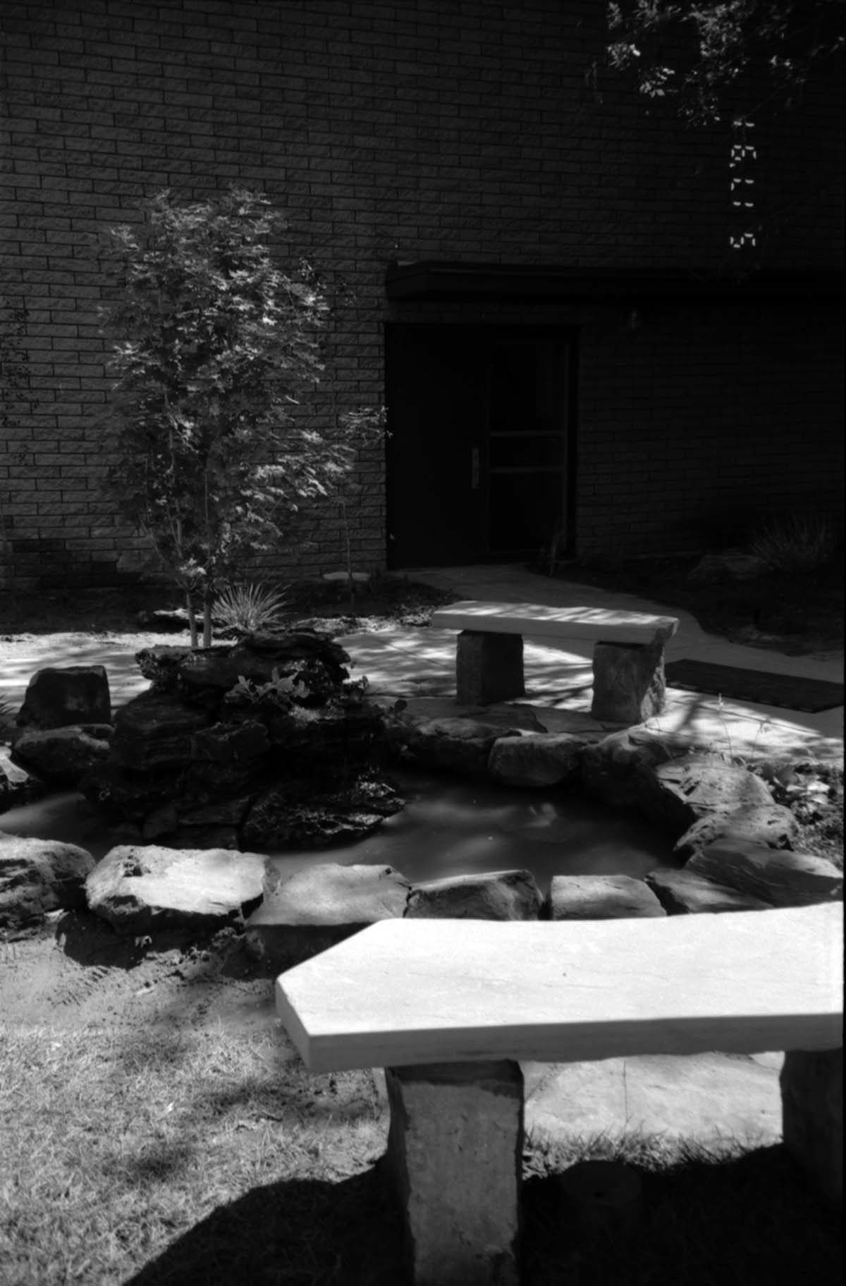 Water fixture in the courtyard are in headquarters during the construction of headquarters addition.