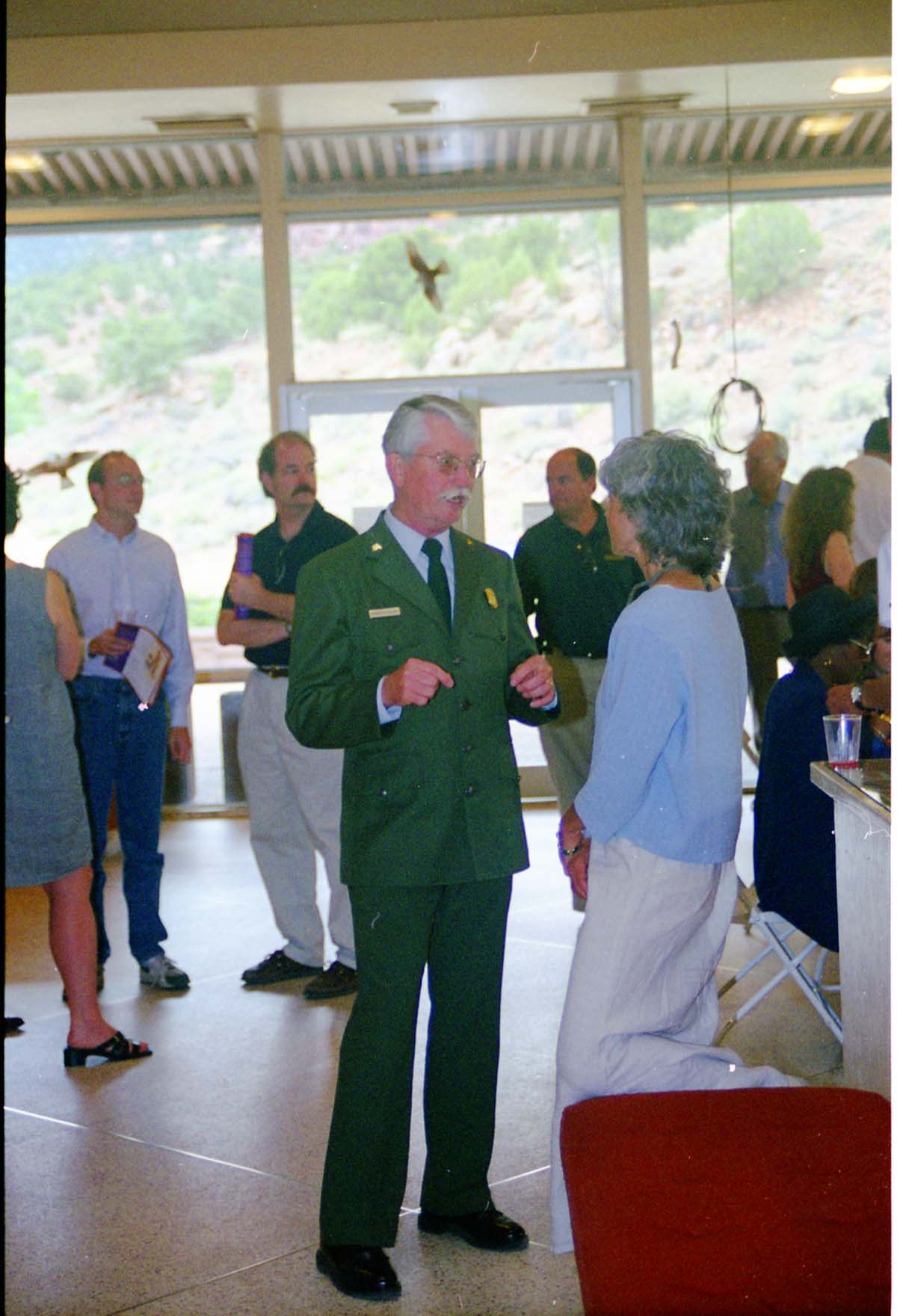 Color Photos of the opening celebration for the new visitor center - Same day as the official shuttle launch. Superintendent Donald A. Falvey speaking with visitor.