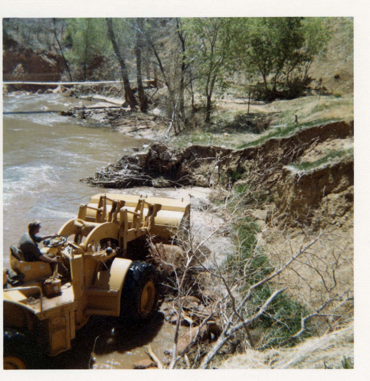 Color photos of channel clearing and bank stabilization along the Virgin River near Birch Creek.