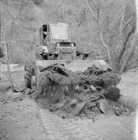 Excavator clearing the road for construction activities near the Temple of Sinawava.