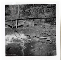 Protection/stabilization of the footings for the old Birch Creek suspension footbridge.