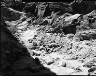 Damage done by storm of July 25, 1954 to West Rim Trail. Looking down and south on switchbacks beyond Refrigerator Canyon leading up to Walter's Wiggles.