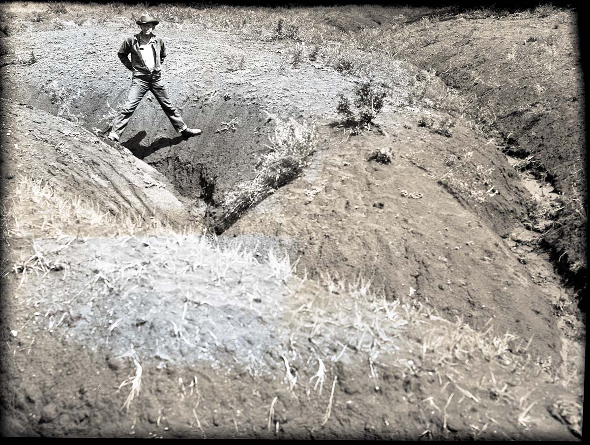Goose creek tributary, Langston land. View of overgrazed open valley cut up with gullies.