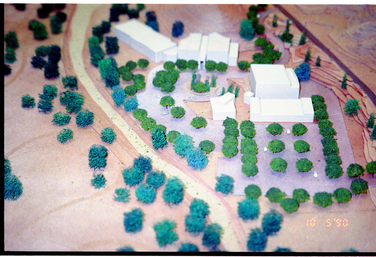 Color photos of an architectural model for an early proposed IMAX complex.