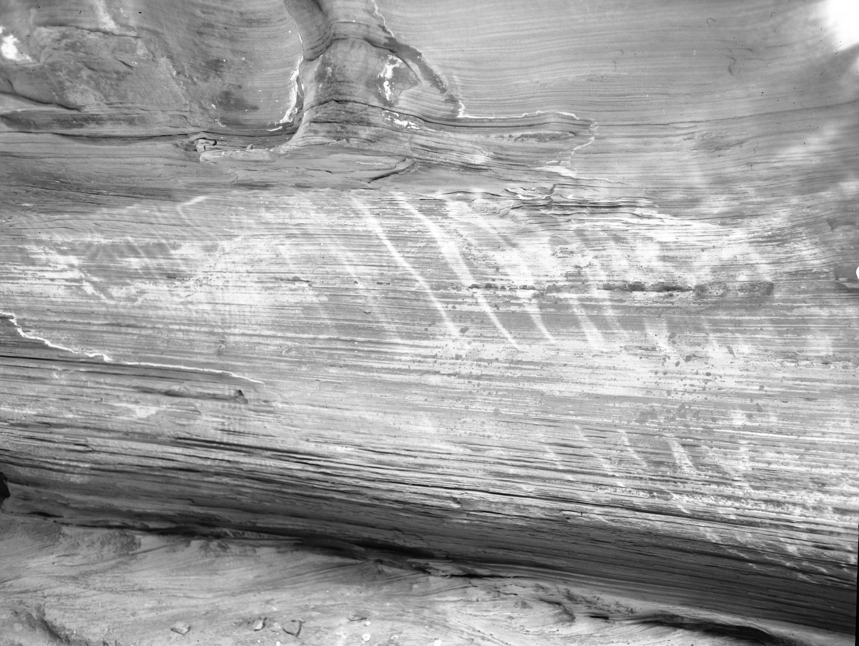 Ripple reflections - Pine Creek- simple lines and forms in nature. Possible fossils showing in wall.